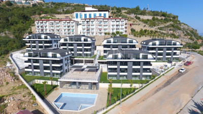 Новый комплекс с квартирами 5+1 с шикарным видом в районе Бекташ фото 1