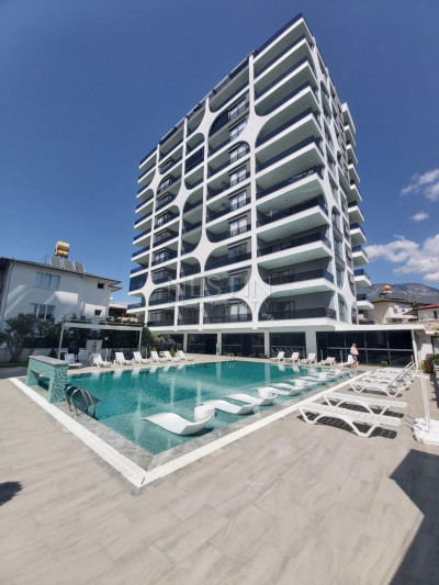 Просторная квартира 4+1 в жилом комплексе в районе Махмутлар фото 1