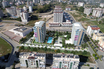Квартиры разной планировки в новом жилом комплексе в районе Авсаллар на этапе строительства фото 11