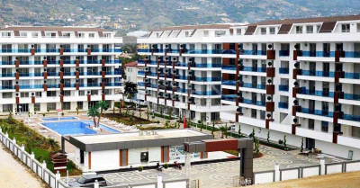 Квартира 2+1 с отдельной кухней в районе Кестель в 200 м от моря фото 1