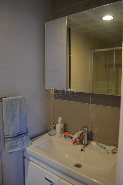 Квартира 2+1 в районе Джикджилли с шикарным видом на море, горы и крепость фото 29