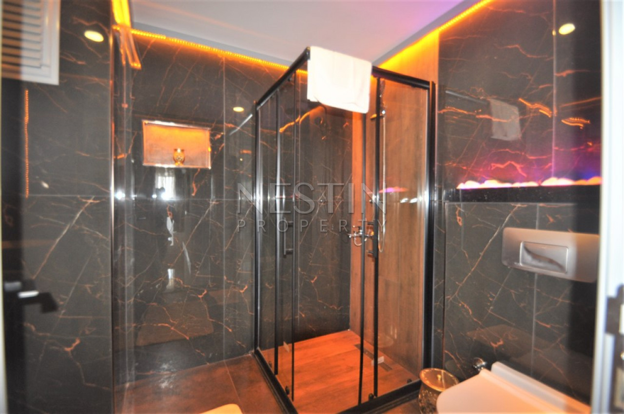 Шикарная квартира 2+1 с видом на реку, горы и море в районе Тосмур фото 40