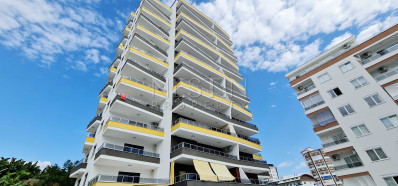 Светлая и уютная квартира 2+1 в новом комплексе в районе Махмутлар фото 1