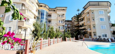 Бюджетная квартира 1+1 в районе Демирташ в 500 м от моря фото 1