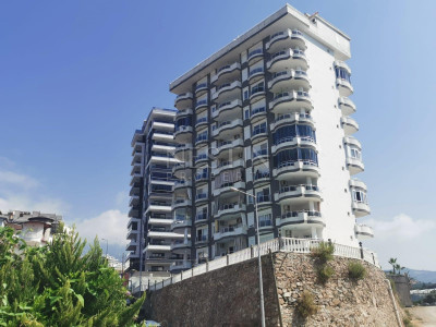 Квартира 2+1 в районе Махмутлар с видом на горы и море фото 1