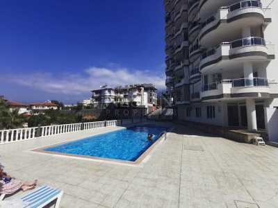 Квартира 2+1 в районе Махмутлар с видом на горы и море фото 2