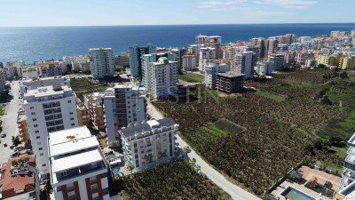 Квартиры 1+1 и 3+1 в районе Махмутлар в новом жилом комплексе фото 11