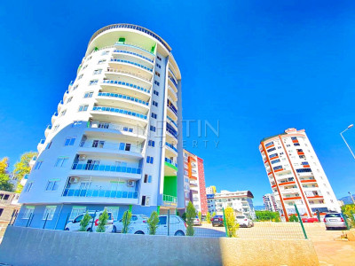 Бюджетное предложение квартиры 1+1 с видом на горы в районе Махмутлар фото 1