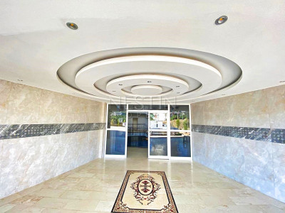 Бюджетное предложение квартиры 1+1 с видом на горы в районе Махмутлар фото 10