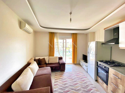 Бюджетное предложение квартиры 1+1 с видом на горы в районе Махмутлар фото 18