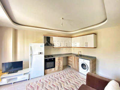 Бюджетное предложение квартиры 1+1 с видом на горы в районе Махмутлар фото 19