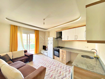 Бюджетное предложение квартиры 1+1 с видом на горы в районе Махмутлар фото 20