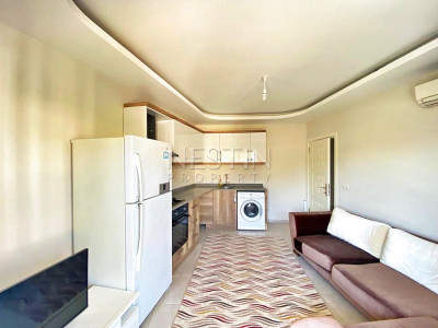 Бюджетное предложение квартиры 1+1 с видом на горы в районе Махмутлар фото 21