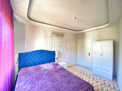 Бюджетное предложение квартиры 1+1 с видом на горы в районе Махмутлар фото 25