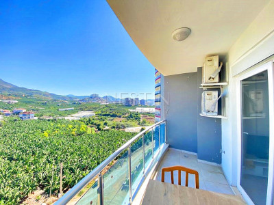 Бюджетное предложение квартиры 1+1 с видом на горы в районе Махмутлар фото 28