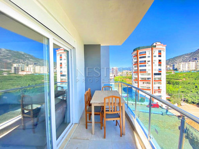 Бюджетное предложение квартиры 1+1 с видом на горы в районе Махмутлар фото 29