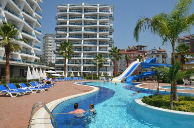 Квартира 1+1 в хорошем комплексе района Джикджилли с видом на море и горы фото 1