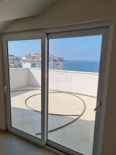 Пентхаус 4+1 в районе Кестель с красивый видом на море фото 12