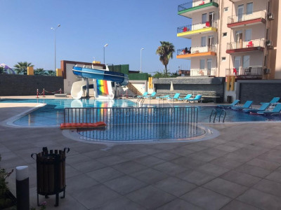 Квартира 2+1 в новом комплексе в районе Махмутлар с видом на море и крепость фото 3