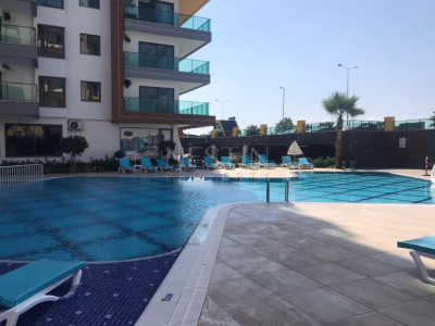 Квартира 2+1 в новом комплексе в районе Махмутлар с видом на море и крепость фото 4