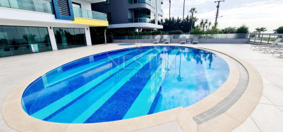 Квартира 1+1 в новом доме в районе Каргыджак с видом на море и горы фото 6