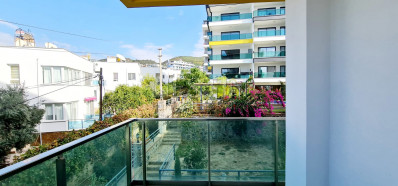 Квартира 1+1 в новом доме в районе Каргыджак с видом на море и горы фото 24