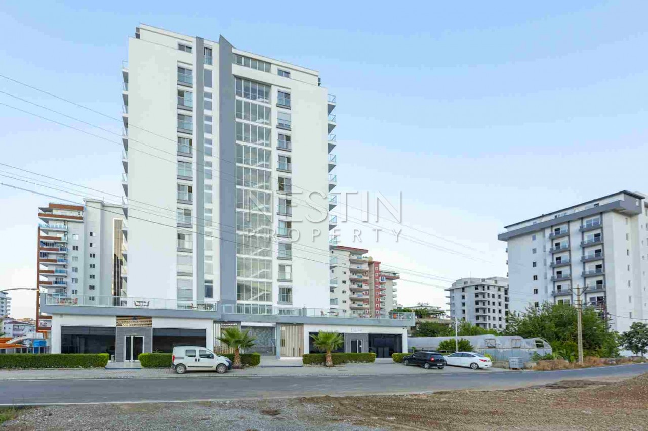 Просторные квартиры 1+1 и 2+1 в новом комплексе в Махмутларе фото 2