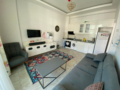 Квартира 1+1 с видом на горы в районе Махмутлар фото 4