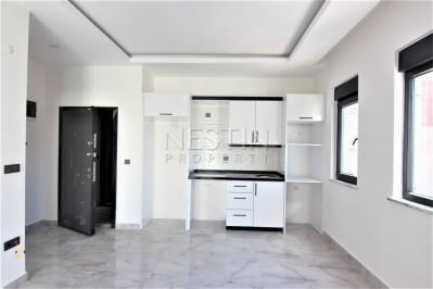 Квартира 1+1 в новом жилом комплексе в районе Махмутлар фото 12