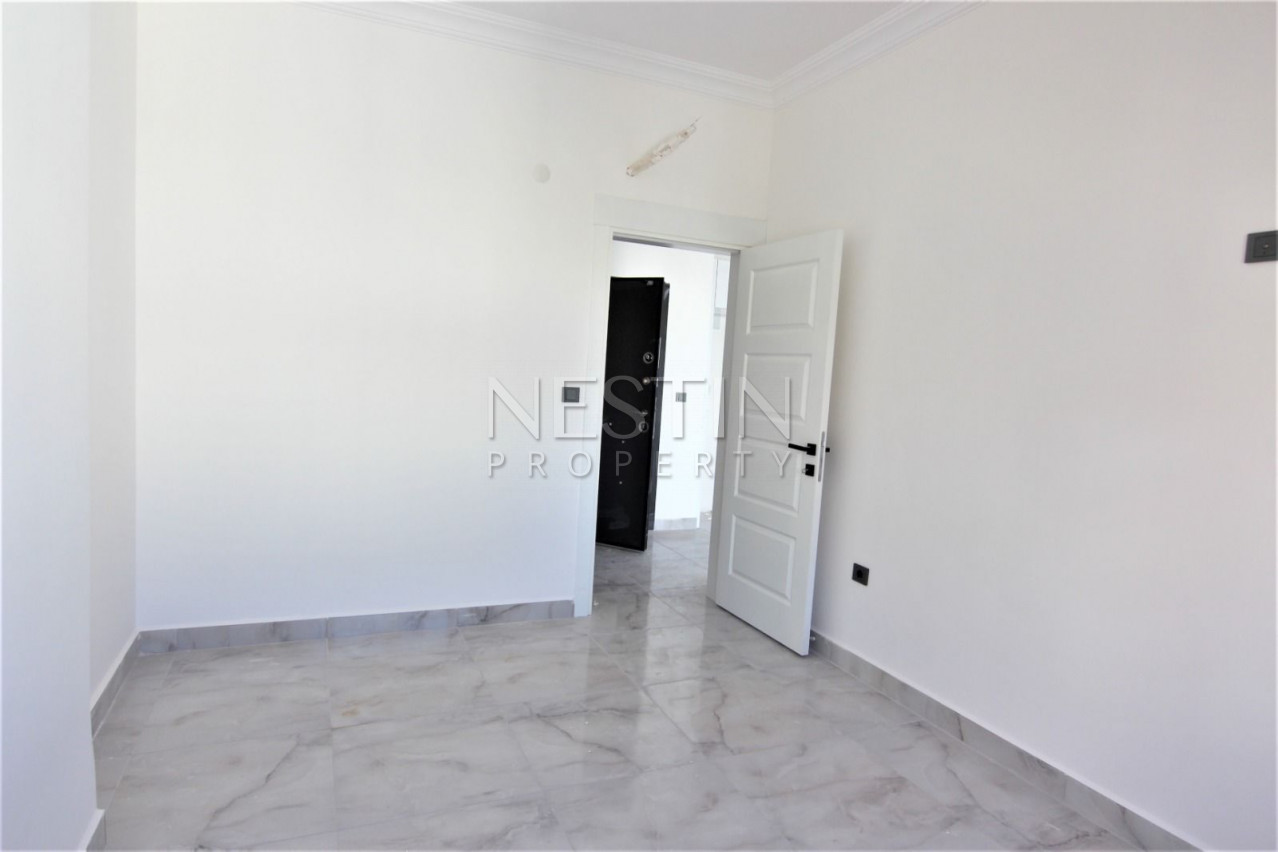 Квартира 1+1 в новом жилом комплексе в районе Махмутлар фото 15