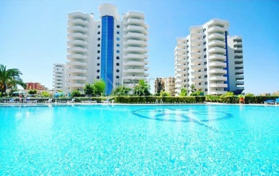 Квартира 2+1 с видом на горы в хорошем комплексе в районе Махмутлар фото 1