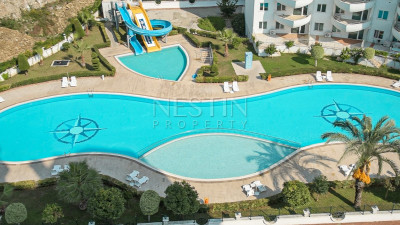 Квартира 2+1 с видом на горы в хорошем комплексе в районе Махмутлар фото 20