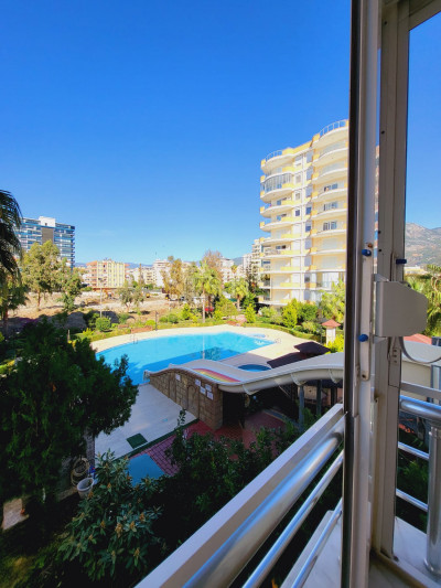 Просторная квартира 3+1 в комплексе на первой линии в районе Махмутлар фото 30