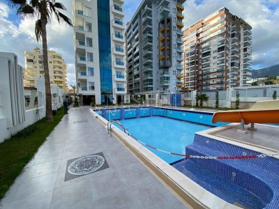 Квартира 1+1 в отличном комплексе в районе Махмутлар фото 2