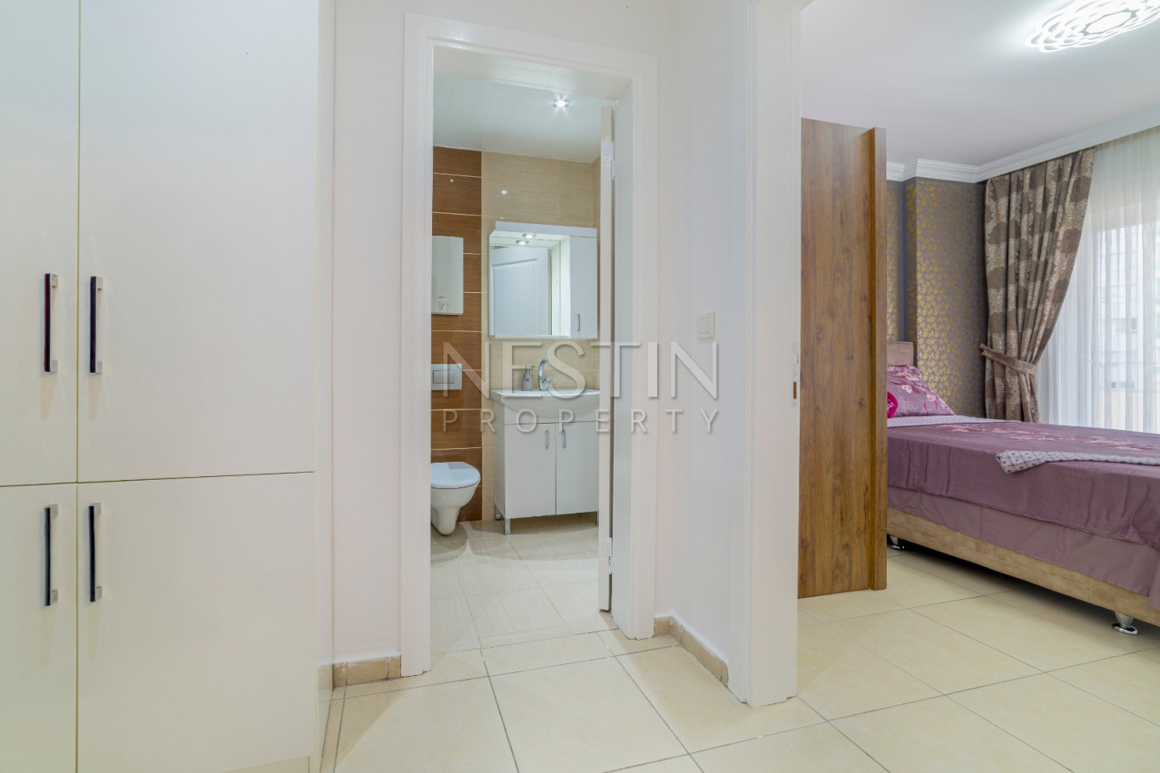 Квартира 1+1 с дизайнерским оформлением в районе Махмутлар фото 7