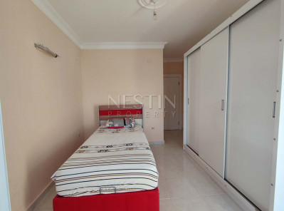 Большая квартира пентхаус 3+1 в районе Махмутлар с красивым видом фото 16