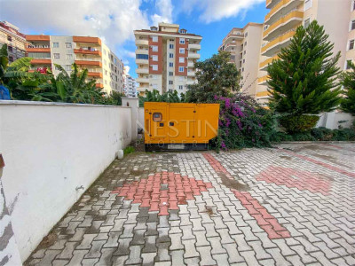 Квартира 3+1 в районе Махмутлар с отдельной кухней фото 3