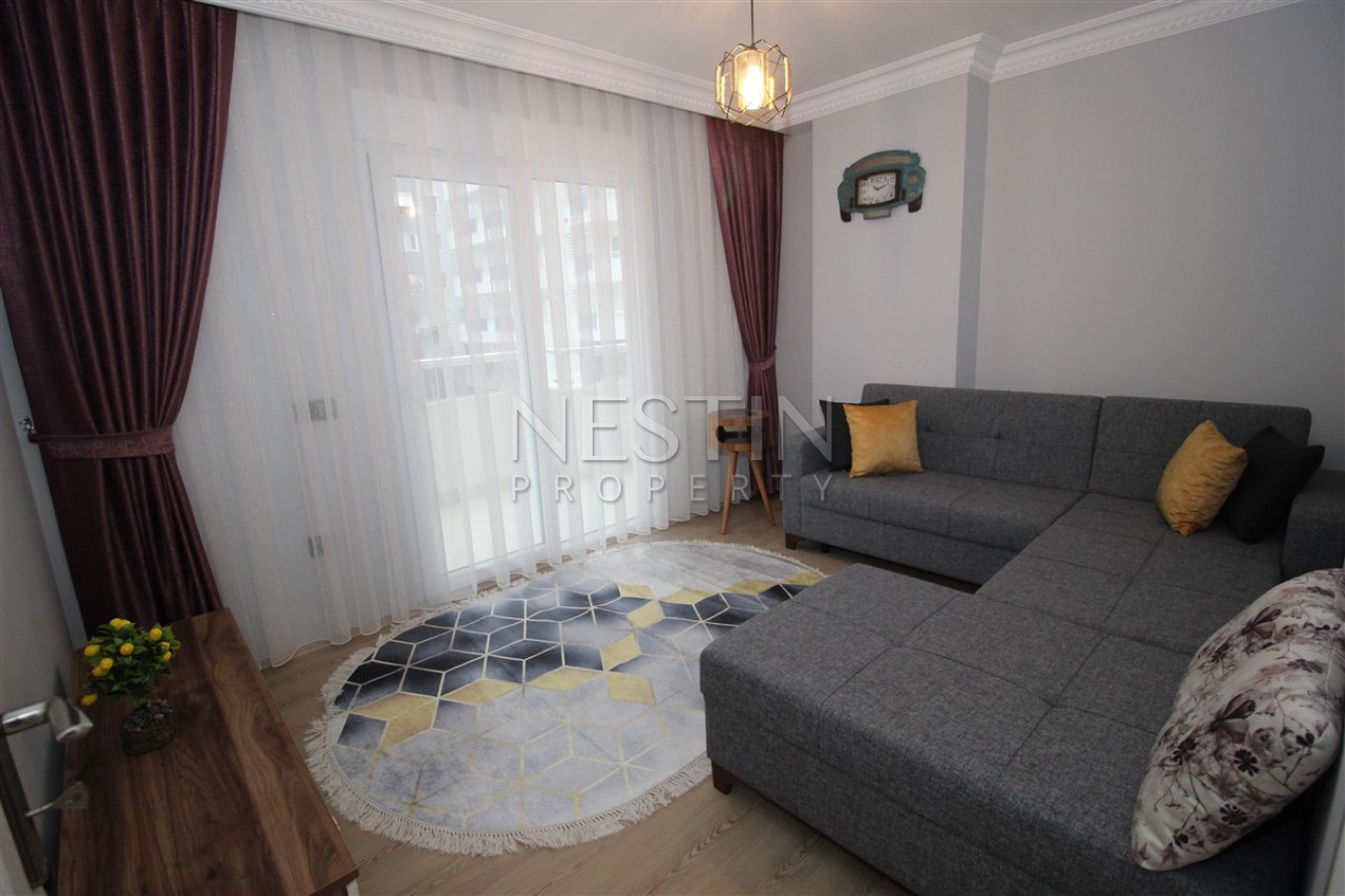 Квартира 3+1 в районе Махмутлар с отдельной кухней фото 17