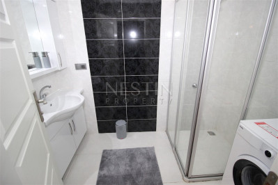 Квартира 3+1 в районе Махмутлар с отдельной кухней фото 26