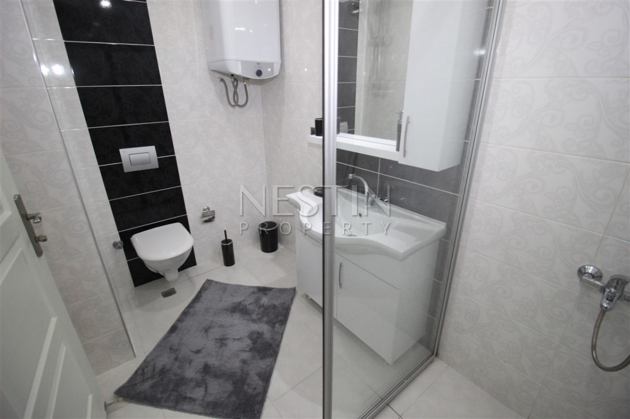 Квартира 3+1 в районе Махмутлар с отдельной кухней фото 27