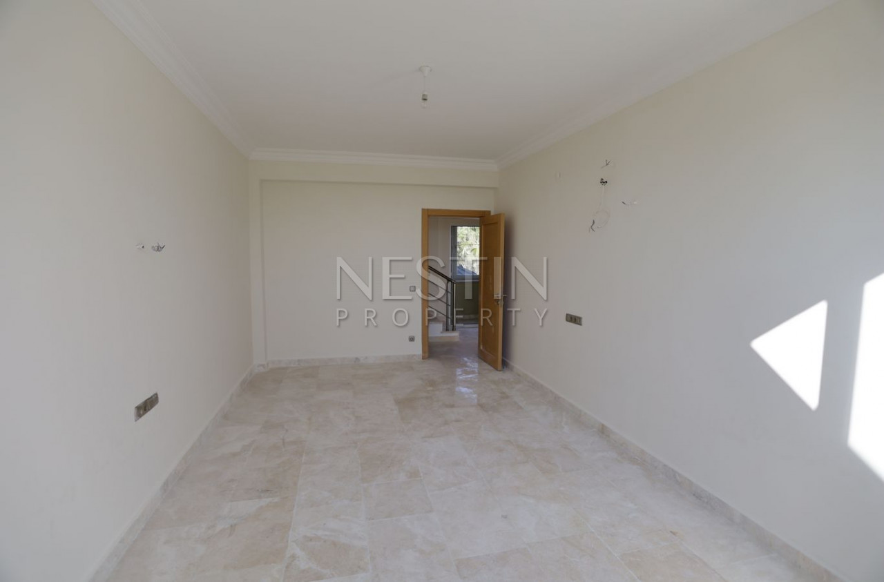 Таунхаус 3+1 в районе Каргыджак с шикарным видом на море и годы фото 20