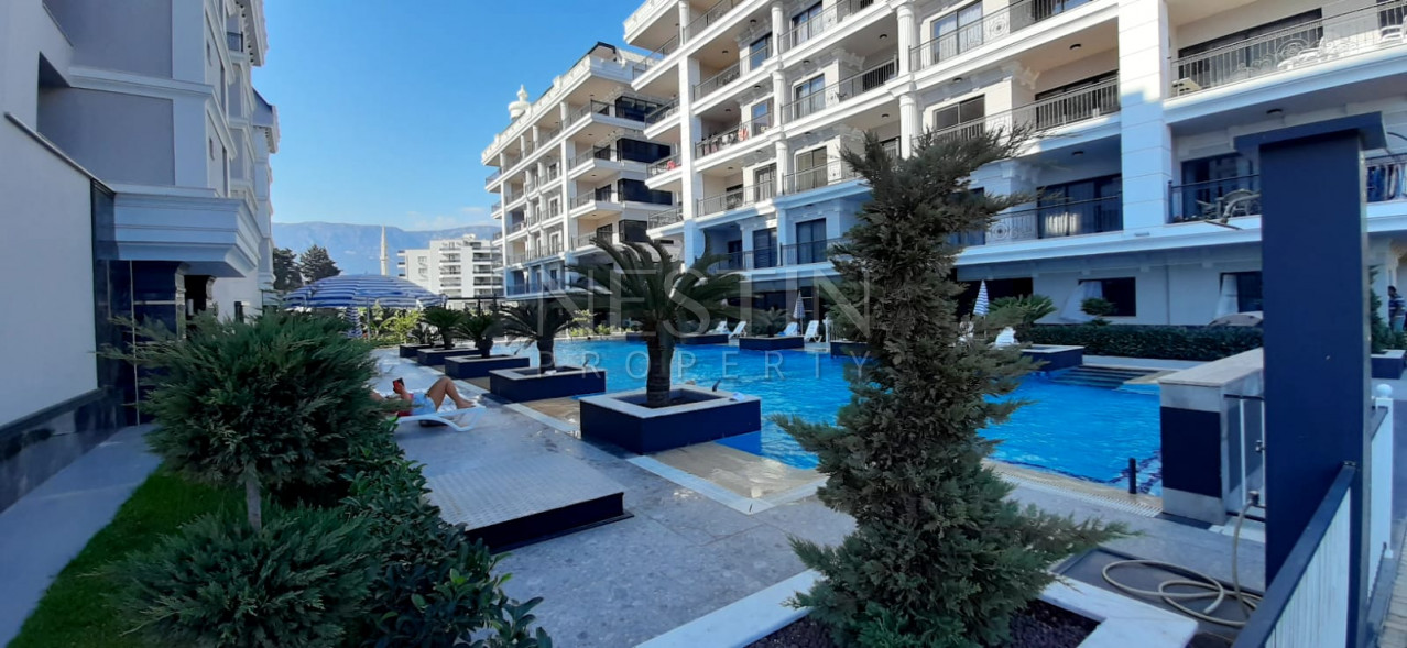 Квартира 2+1 в хорошем комплексе в районе Каргыджак в 100 м от моря фото 1