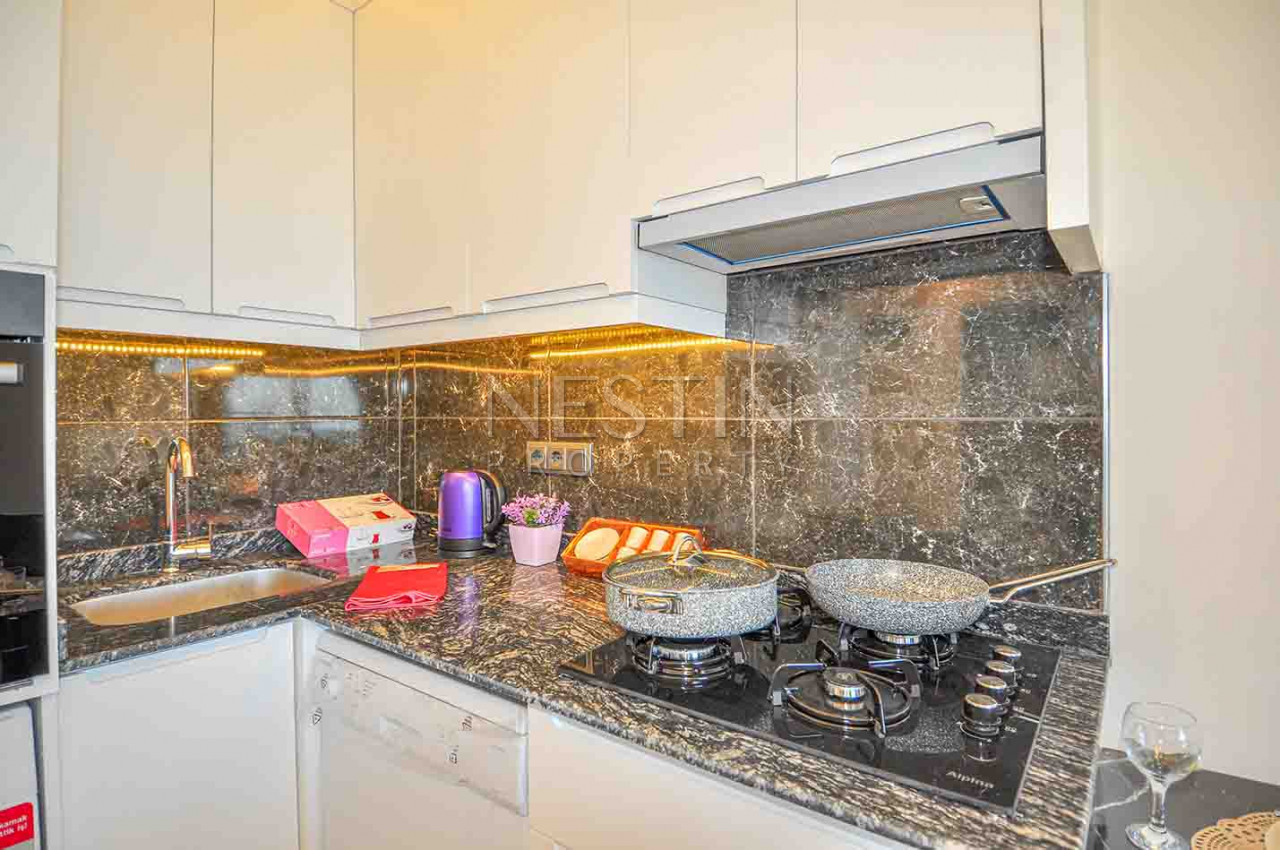 Квартиры 1+1 в новом жилом комплексе в районе Каргыджак в 100 м от моря фото 40