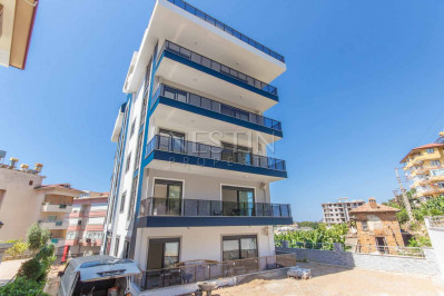 Просторная квартира 3+1 в новом доме в центре города Аланья фото 1