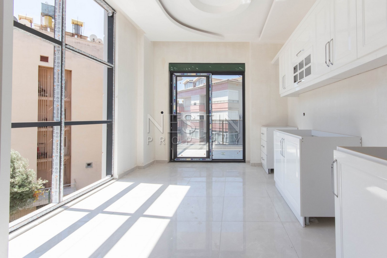 Просторная квартира 3+1 в новом доме в центре города Аланья фото 20