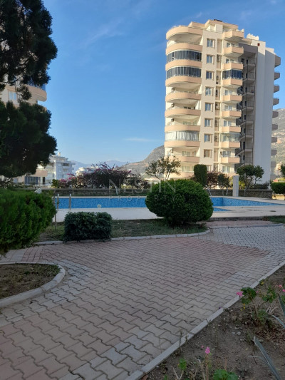 Квартира 2+1 с красивым видом на море и горы в районе Махмутлар фото 2