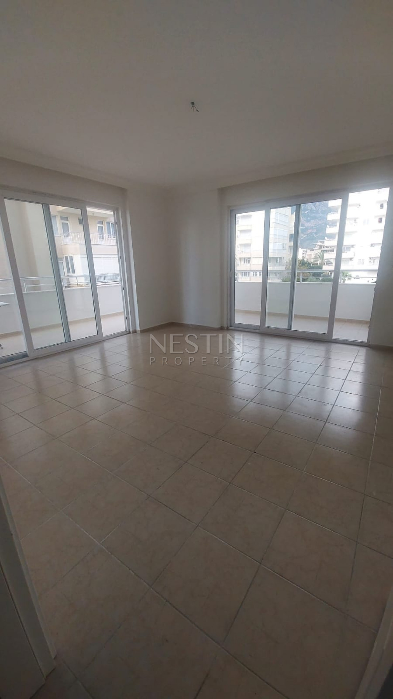 Квартира 2+1 в районе Махмутлар с видом на море и горы фото 5