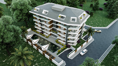 Квартиры 1+1 и 2+1 в комплексе на этапе строительства в районе Махмутлар фото 1