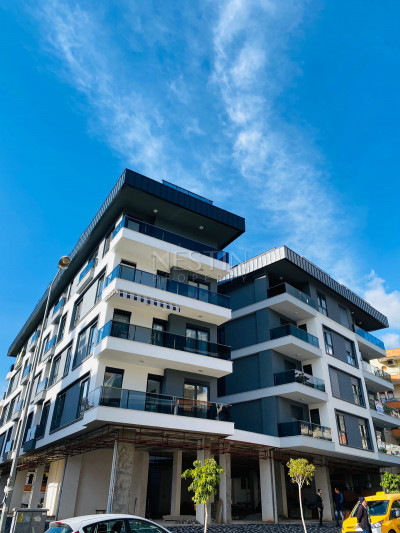 Квартиры 1+1 в новом доме в центре города Аланья в 500 м от моря фото 2