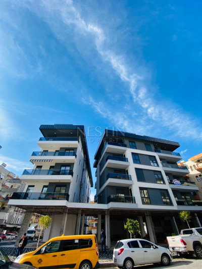 Квартиры 1+1 в новом доме в центре города Аланья в 500 м от моря фото 3